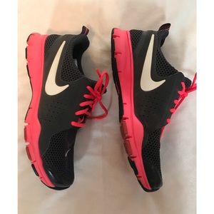 Gray and pink Nike running shoes